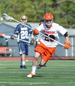 Peter Macartney carries the ball upfield. Macartney tallied a season-high five ground balls.