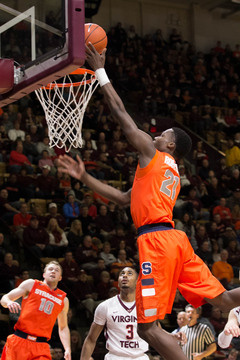 Tyler Roberson puts in a left-handed layup off the backboard. He went 2-of-5 from the field in the opening frame.