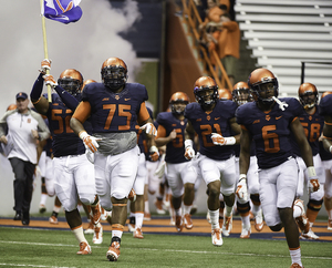 Wayne Williams (75) switched up his diet and dedicated himself to losing 50 pounds before the start of this season. Now, he's slowly developing into a contributor for the Orange's run defense.