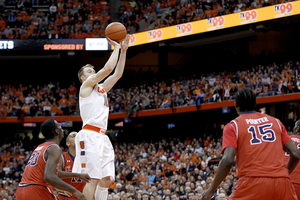 Trevor Cooney, seen here shooting against St. John's, has struggled mightily from 3-point range, underlining Syracuse's biggest dilemma of the season.