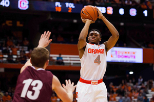 Ron Patterson elevates for a jumper with Colgate's Andrew Bargmann defending. The SU sophomore had 13 points on 5-of-9 shooting, including 3-of-6 from deep, showing he can be an alternate threat from deep aside from Trevor Cooney.