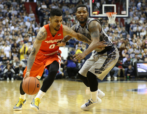 Michael Gbinije scored 17 points as Syracuse got back on track against Colgate. 