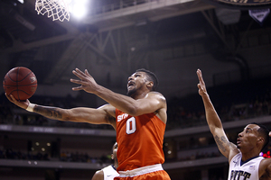 Michael Gbinije scored 14 against Pittsburgh on Dec. 30, and has scored double-digit points every game this season.