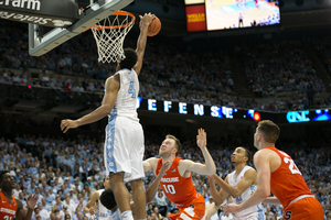 UNC forward Isaiah Hicks blocks a shot by Trevor Cooney. It was Hicks' lone blocked shot during the game.