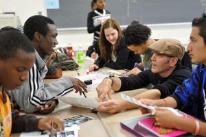 Stephen Mahan III (right) mentored students in Syracuse city schools through SU's Photography and Literacy Project. He died on July 26. 