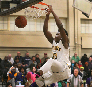 Isaiah Stewart dunks the ball.