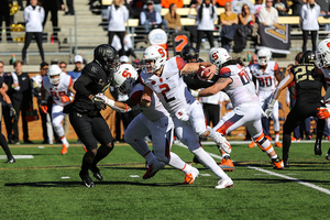 Eric Dungey runs up the field.