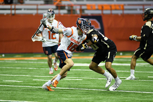 Brendan Curry, pictured against Army, is one of 50 players on the list.