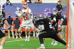 A second-half explosion by Chase Scanlan tied a career-high in goals for him as the Orange won 15-6.