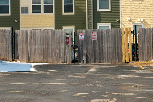 The fences between Aspen Building 3 and the adjacent community were blown down by the wind or intentionally damaged multiple times. Residents have witnessed people from the adjacent community trespassing the fences into Aspen for at least two or three times. 