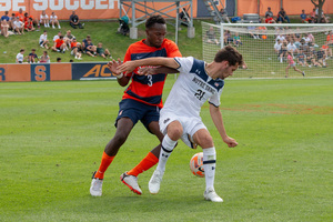 Abdi Salim (pictured, left) believes he is as strong as he was before he tore his ACL in his right knee.