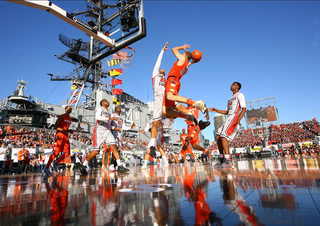 Brandon Triche of the Syracuse Orange shoots the ball against Jamaal Franklin of the San Diego State Aztecs during the Battle on the Midway game on Sunday.