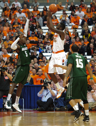 Syracuse forward Rakeem Christmas takes a baseline jumper.