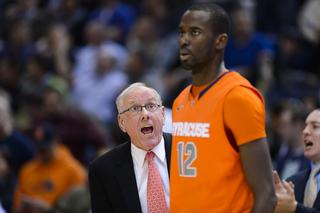 Syracuse head coach Jim Boeheim yells at center Baye Moussa Keita on the sideline.