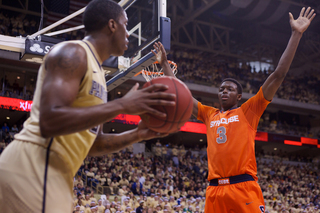 Syracuse forward Jerami Grant contests an inbounds pass as the Orange tried to pressure the Panthers to force a late-game turnover at the Petersen Events Center on Saturday. Pitt defeated the Orange 65-55 in the Big East matchup. Grant finished with 5 points and five rebounds on 1-8 shooting. 