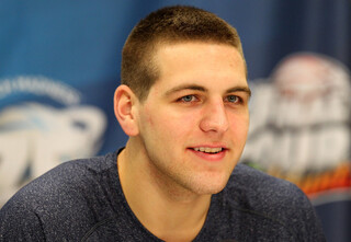 Mitch McGary (4) of the Michigan Wolverines looks on during the Final Four interviews.