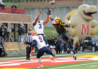 Durell Eskridge reaches up to pick off a pass in the end zone. Eskridge left the game in the second half with an upper-body injury.