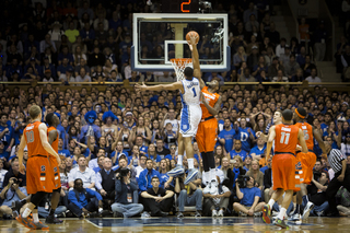 Rakeem Christmas fouls Jabari Parker on a dunk attempt. 