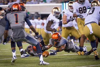 Eskridge pounces on a fumble in the third quarter after Desir strips Bryant of the ball.