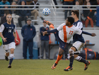 Syracuse forward Chris Nanco looks to control the ball.