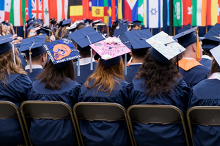 Students decorated their caps with messages, quotes and artistic designs. 