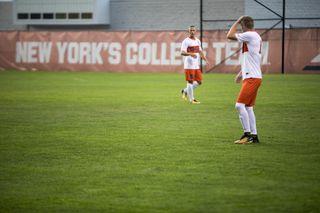 The SU Soccer Stadium grass stayed relatively dry Sunday night. 