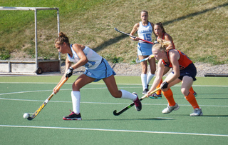 Elaine Carey (right) scored Syracuse's other goal to pull within one.