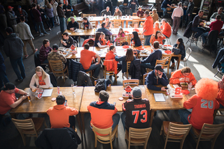 The Warped Wing Brewery, a bar in Dayton, was filled with orange before the game. Many of the fans had doubted that SU would be in the Tournament. 