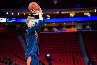 Dolezaj rises up for a jump shot during practice.