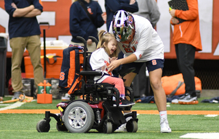 Maddy Hertweck, who battles Cerebral Palsy, signed her letter of intent to join the Syracuse women’s lacrosse team before this season. On Saturday, she watched Syracuse defeat Virginia. 