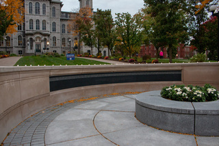 Candles stay lit at the Place of Remembrance, even after the crowd of Remembrance Scholars and other attendees dissipated. The scholars have planned for a rose laying ceremony to take place on Friday at the same location.